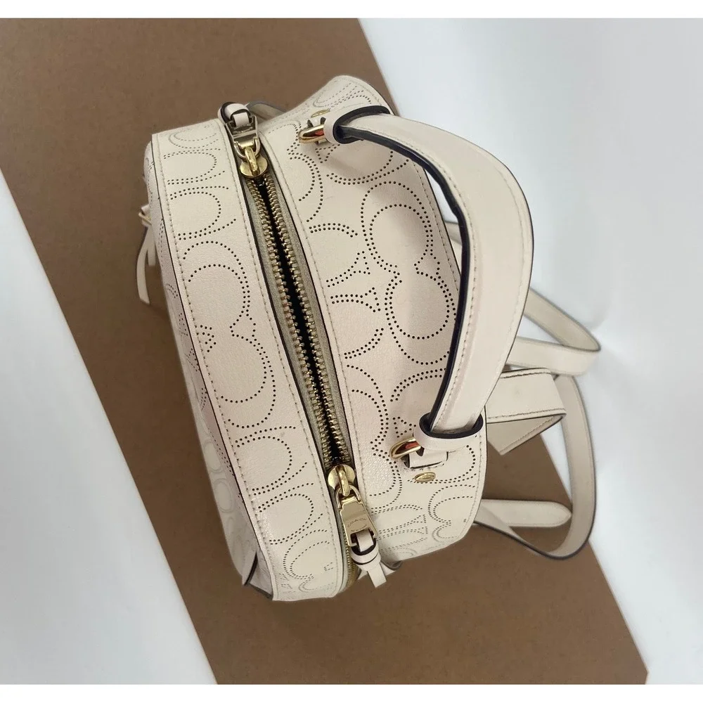 Coach Jordyn Backpack Chalk White Perforated Signature Leather Bag F72645